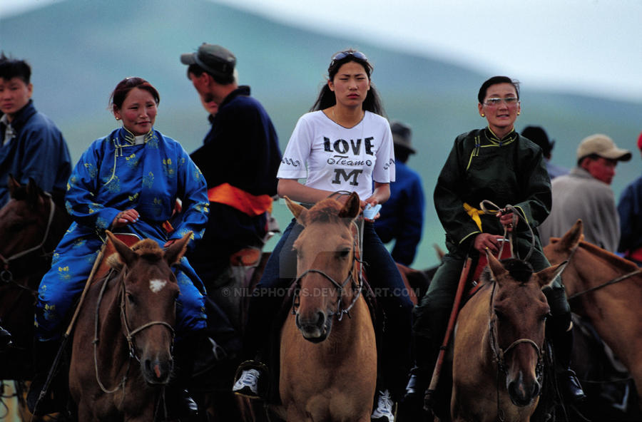 mongolian_women_on_horse_by_nilsphotos-d