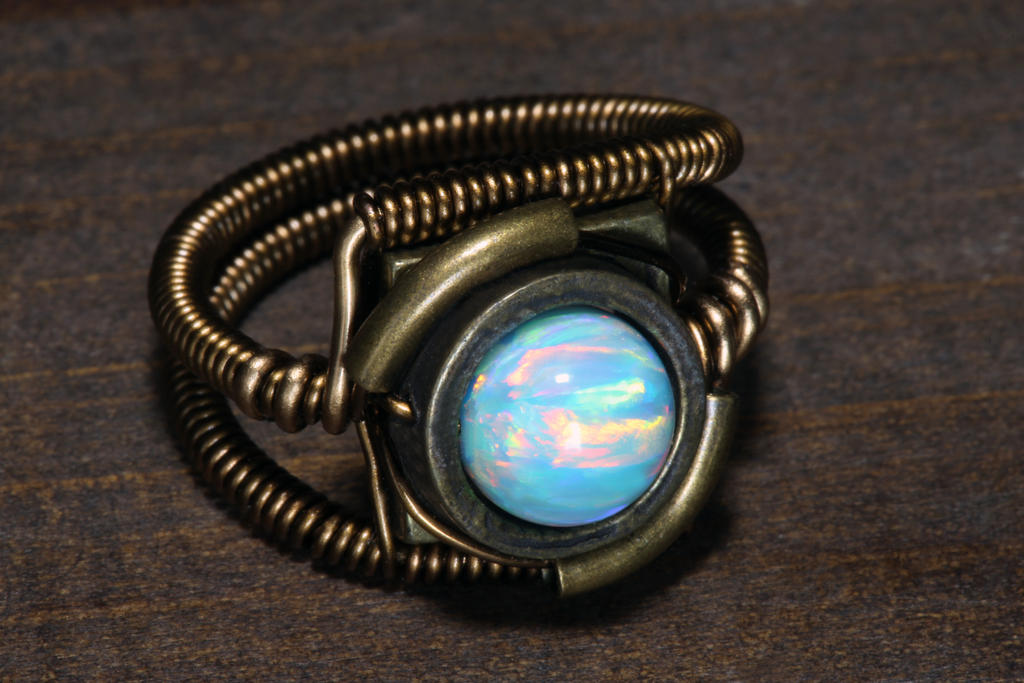 fire_and_ice_opal_steampunk_ring_by_catherinetterings-dbkdqh2.jpg
