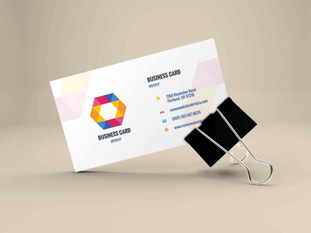 Freebie - Business Card Mockup In Binder Clip by GraphBerry